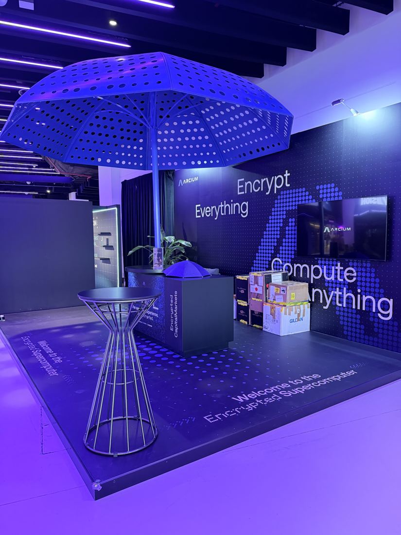 Second angle of the Arcium booth with high table